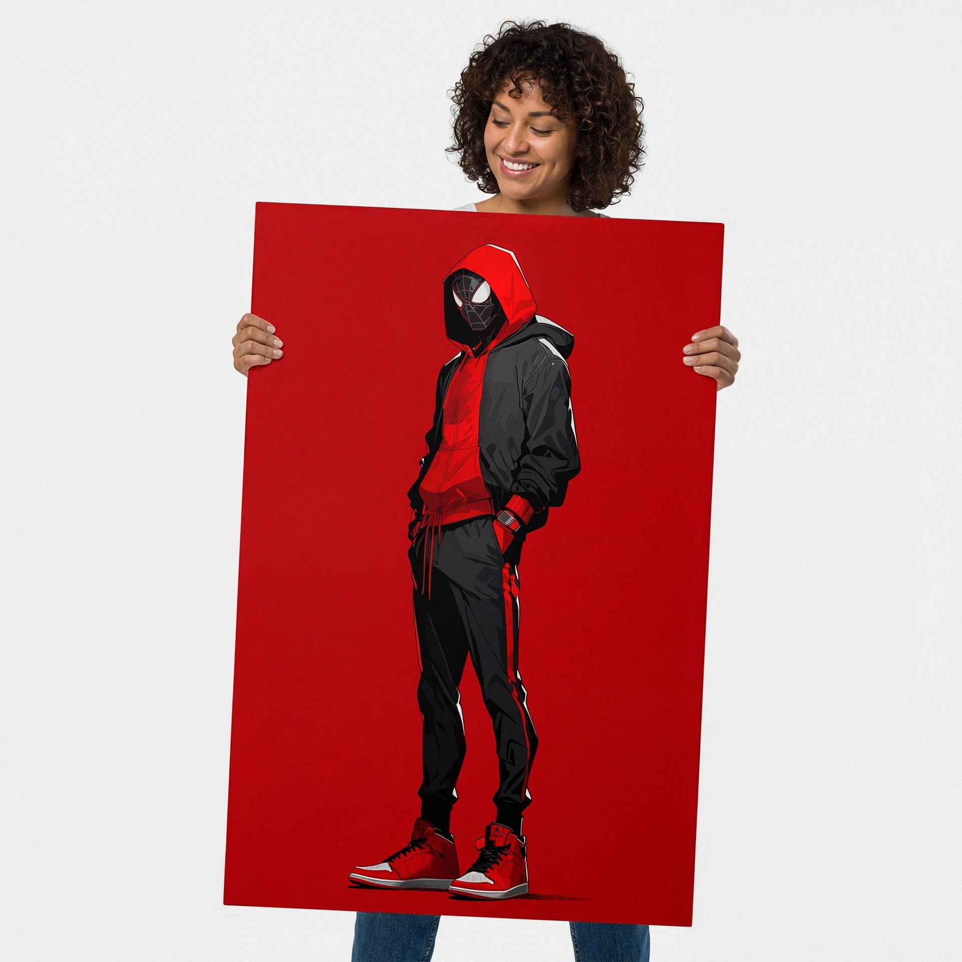 Person holding a red poster with a stylized illustration of a person in a red and black outfit. Person wearing a red and black hoodie with a mask on a red background, leaning against a brick wall. Red mouse pad with black border on a white background Person wearing a red and black hoodie with a spider emblem on a red 