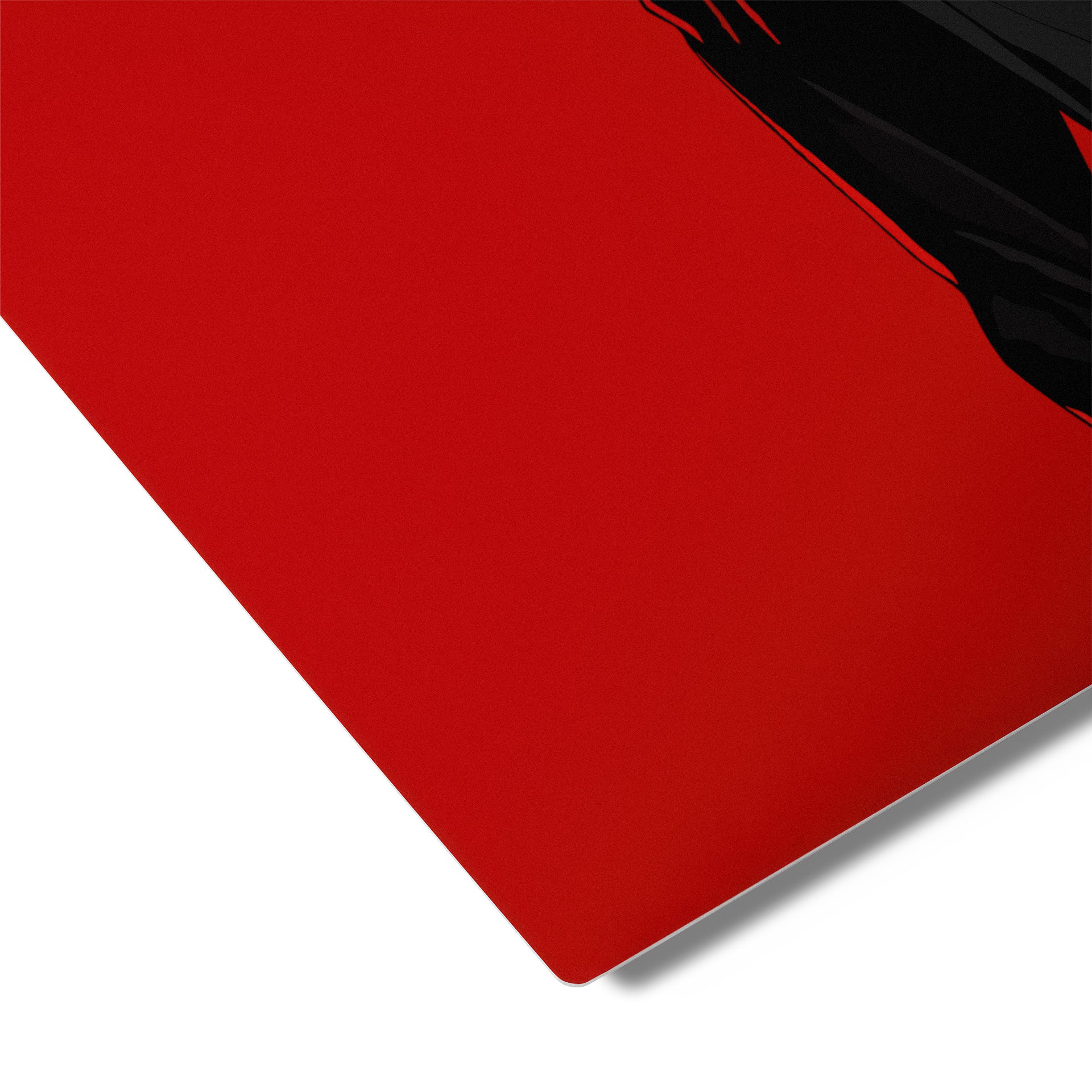 Red mouse pad with black border on a white background Person wearing a red and black hoodie with a spider emblem on a red 